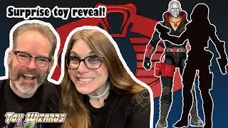Scott surprises Loryn with a very special G.I. Joe toy on camera!