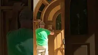 refinishing a front door on a mansion in Silicon Valley