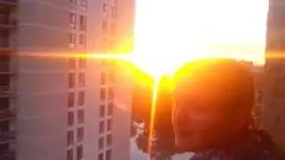 Katherine and sunset on Evergreen balcony
