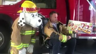 Chief Williams reading Firehouse by Mark Teague