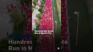Hundreds of people took part in a traditional Santa Run in Mexico City, wearing Santa Claus costumes