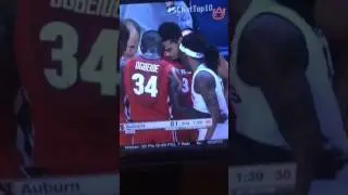 Auburn player in Georgia huddle