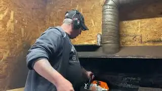 Donny walkers chainsaws showing customer a Stihl 461 and 261 walkerized