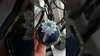 Round Aquamarine Snowflake Halo Engagement Ring.