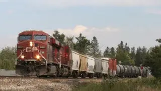 CP 8807 Leads CP 401 West Near Brickburn Calgary AB. CP Laggan Subdivision.