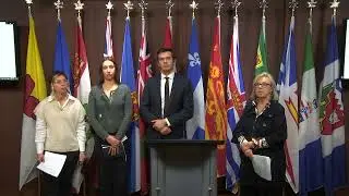 Press conference opposing RBC's takeover of HSBC Canada