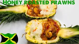 Honey roasted prawns stuffed in pineapple with seasoned rice