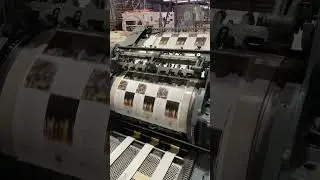 Our #Heidelberg Cylinder Hot Foiling machine laying down 3 feeds of reflective Gold Foil #weareprint