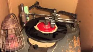 Record lathe cutting a record maid from plastic picnic plate Boonsburg Egg
