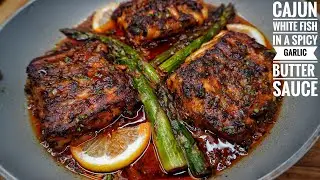 CAJUN WHITE FISH AND ASPARAGUS IN A SPICY GARLIC BUTTER SAUCE