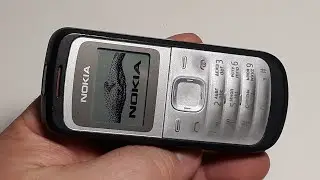 Nokia 1203 - не дорогой оригинальный телефон с голубой подсветкой и громким динамиком + фонарик