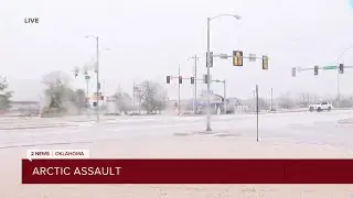 Snow begins falling in Jenks on Feb. 18