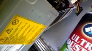 using compressed air can to clean computer