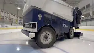 Zamboni Resurfacing the ice.