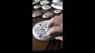 Sanding and varnishing a paper stone