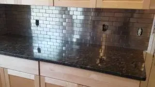 Stainless steel backsplash from Lowe's