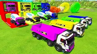 Гараж, полный красок - красочный самосвал Volvo FMX, бетоносмеситель Volvo перевозит вещи в красо...