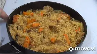 Рисовая каша на сковороде . Pilaf in a frying pan. Pilaw in einer Pfanne