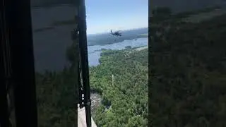 UH-60M Black Hawks in formation over Northern Michigan