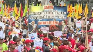 Venezualan government supporters rally to mark 'El Caracazo' | AFP
