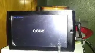 7033