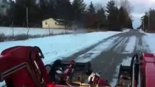 Driving into Nevis, Minnesota in a Tractor