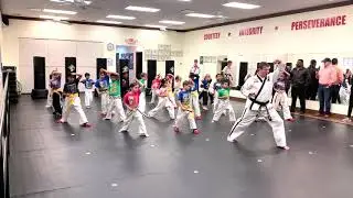 Spicar's Martial Arts students practicing intensity during their karate class