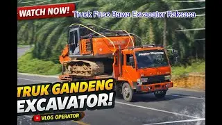 Truck Fuso Bawa Exvacator Raksasa Lewat Jalan Umum Di Bukit Kodok.