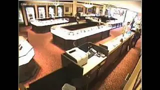 Surveillance Video: Armed man steals watches worth $45,000 - 2013-05-09