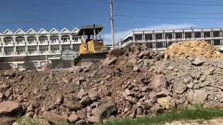 Good Luck working Pouring soil with gravel dump truck and komatsu bulldozer 
