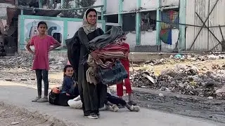 Palestinians flee Israeli offensive and desolation in northern Gaza on donkey carts and on foot