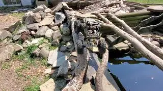 Trx4 1/16th zombie jeep makes it up the extremely hard obstacle.