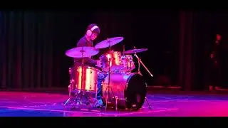 Me playing the drums in the talent show 
