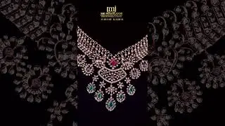 Stunning Diamond Necklace with ruby & emerald accents, crafted to perfection&mdash;a true masterpiece.