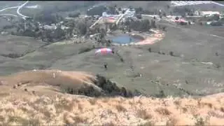 Skydivers flying off Bulwer Mountain