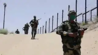 BSF jawans in jaisalmer Rajasthan at 50 degree temperature patrolling by foot and camels.
