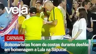 Bolsonaristas ficam de costas durante desfile em homenagem a Lula na Sapuca&iacute;