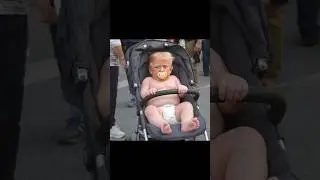 Baby Trump Steals Pacifier From Putin