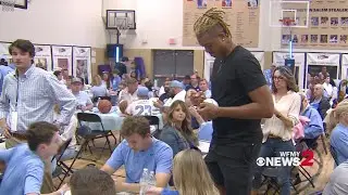 UNC basketball players sign autographs at the Iron Five Tour stop