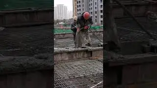 Worker using vibrator in slab rmc