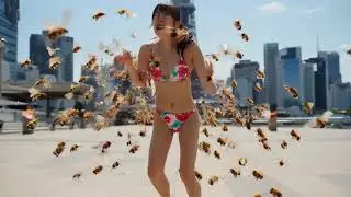 A Japanese woman in a bikini is attacked by many bees in Tokyo #Tokyo, #bikini, #Japanese woman,