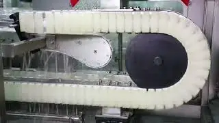 MTW Bottle washing machine with bottle clamping mechanism