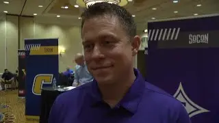 Palmetto Sports' Ella Grogan speaks with Furman basketball head coach Bob Richey at SOCON Media D...