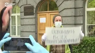 Defendant's Father Holds Protest As High-Profile Russian 'Network' Case Resumes