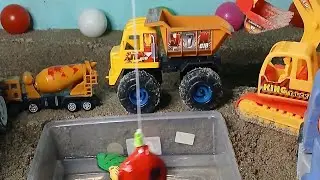 Construction Trucks Building a Fun Fishing Pond