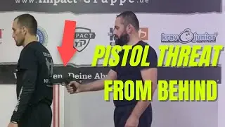 Krav Maga training in less than a minute- defending a pistol threat from behind