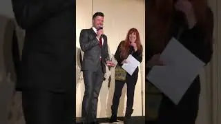 Mauricio Martinez Gives the Heart of Gold Award to Leslie Greenberg