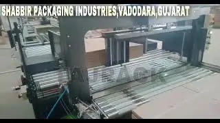 Fully automatic corrugated box strapping machine with straightening parts