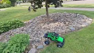Traxxas rustler with jeep wrangler body crawling, speed test# Traxxas # rustler# crawling.# handling