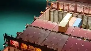 Container Terminal at the seaport. Loading the vessel with containers.